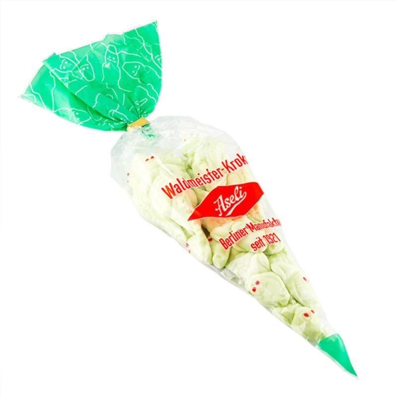 Spitztüte mit Waldmeister-Krokodilen von Aseli – klassische Schaumzucker-Süßigkeit in hellgrüner Farbe mit rotem Etikett und transparentem Beutel.