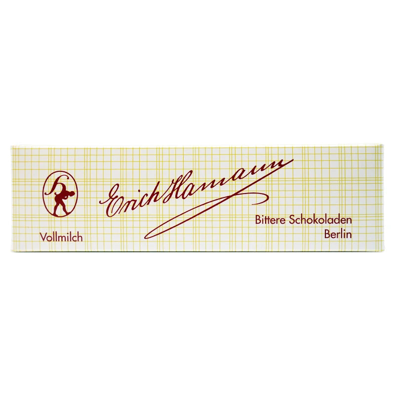 Verpackung der Erich Hamann Hauchdünnen Vollmilch-Schokoladenplatten – elegantes Design mit rot-gelbem Linienraster, Vollmilch-Schriftzug und klassischem Logo der Berliner Manufaktur.