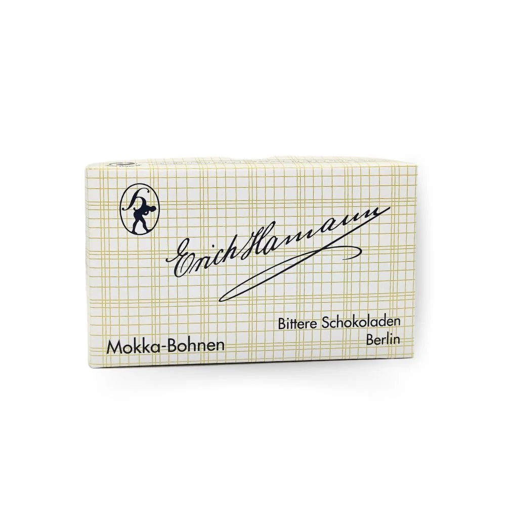 Erich Hamann Mokka-Bohnen 75 g – klassische Pralinenschachtel mit Gittermuster und schwarzer Handschrift. Berliner Bitterschokoladen-Spezialität in traditioneller Verpackung.