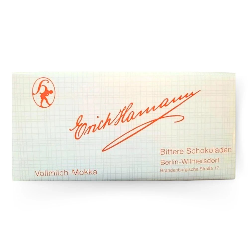 Erich Hamann Vollmilch-Mokka Schokolade 100 g – handgefertigte Berliner Tafel mit 34 % Kakao, verpackt in klassischer Gitterpapierhülle mit roter Handschrift. Spezialität aus Berlin-Wilmersdorf mit feiner Mokkanote.