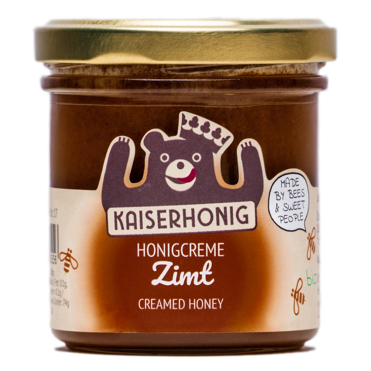 Braunes Glas Kaiserhonig Honigcreme Zimt mit goldenem Deckel, Bärenlogo mit Krone und der Aufschrift „Made by Bees & Sweet People“.