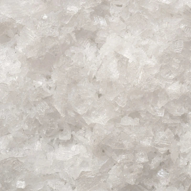 Grobe, weiße Meersalzflocken – hochwertige Zutat für das Knalle Popcorn Salz & Butter. Fein abgestimmt für einen ausgewogenen, herzhaften Geschmack.