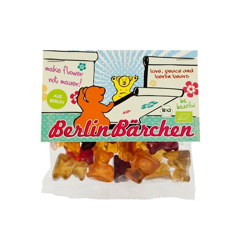 Mind Sweets Berlin Bärchen – vegane Fruchtgummis im 50 g Beutel mit Berliner Mauer-Motiv: Bären reißen Mauern ein und setzen bunte Botschaften wie ‚make flower not mauer‘ und ‚be bearlin‘. Bio, aus Berlin, mit Statement.