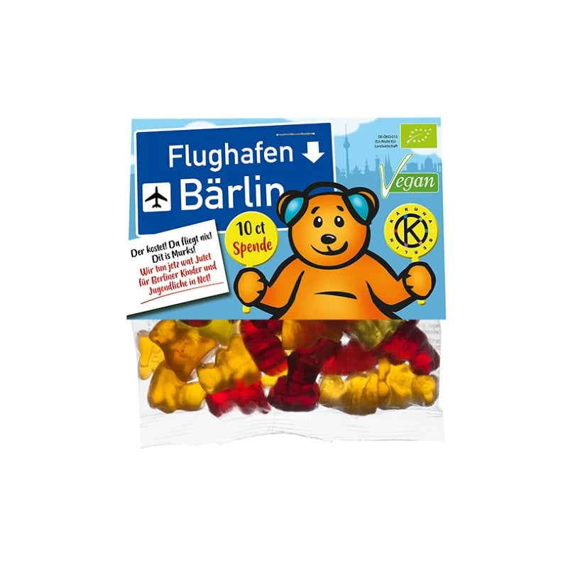 Mind Sweets Flughafen Bärlin – vegane Bio-Fruchtgummis im 50 g Beutel mit lustigem Berliner Bären im Piloten-Outfit. Mit Augenzwinkern: ‚Der kostet! Du fliegst nich!‘ – 10 ct Spende pro Tüte für Kinderhilfsprojekte in Berlin.