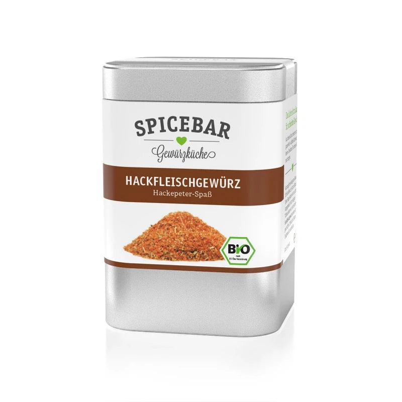 Silberne Gewürzdose von Spicebar mit braunem Etikett „Hackfleischgewürz – Hackepeter-Spaß“, illustriert mit einem kleinen Gewürzhügel und Bio-Siegel.