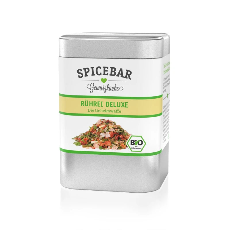 Spicebar Bio-Gewürzmischung Rührei Deluxe in silberner Dose mit gelbem Etikett und farbenfroher Illustration der Gewürzmischung auf der Vorderseite.