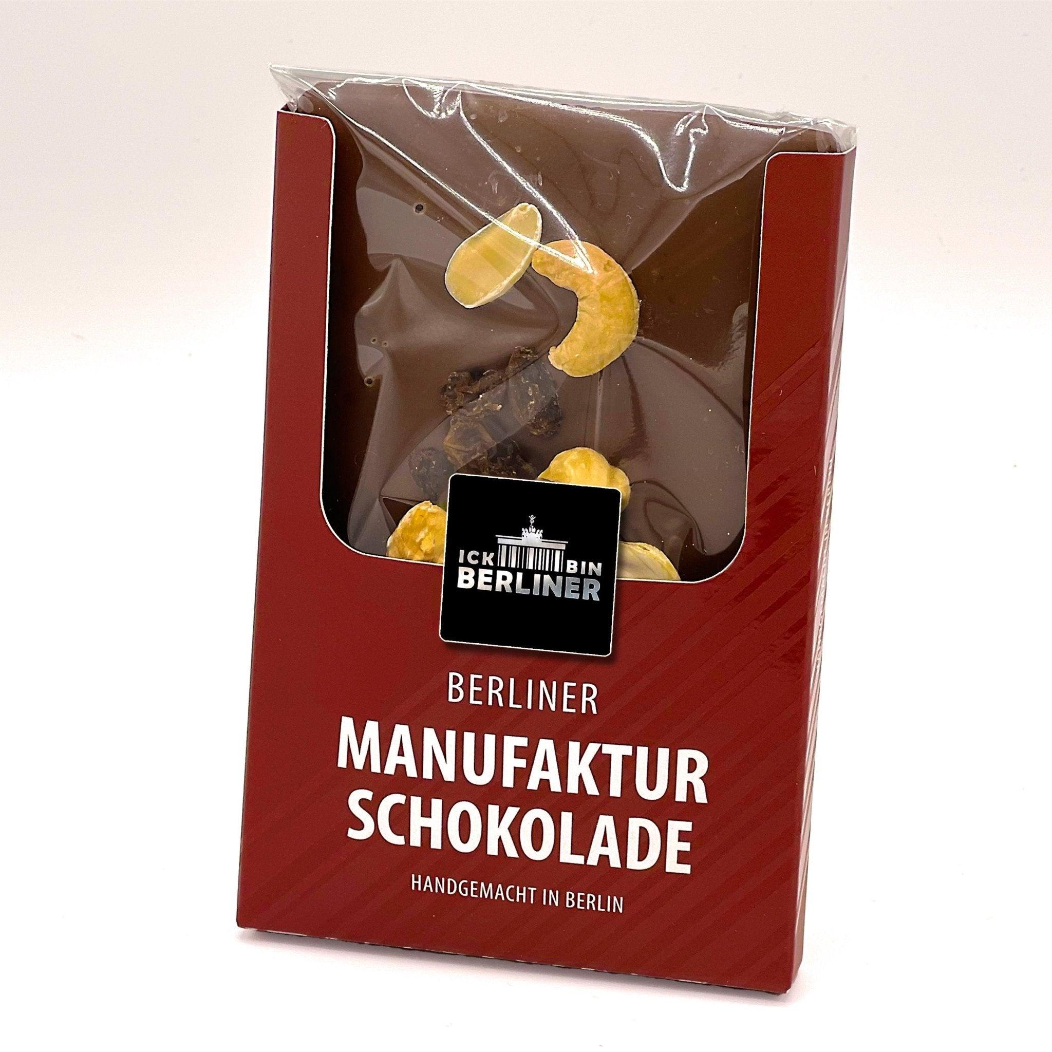 Verpackte Berliner Manufaktur-Schokolade mit Trauben und Nüssen – liebevoll hergestellt für Genießer mit Sinn für Regionalität.