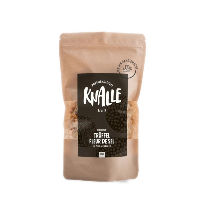 Knalle Popcorn Trüffel Fleur de Sel, 100 g – edles Popcorn im braunen Standbeutel mit schwarzem Etikett. Berliner Manufakturprodukt, CO₂-neutral gebacken mit feiner Trüffelnote.