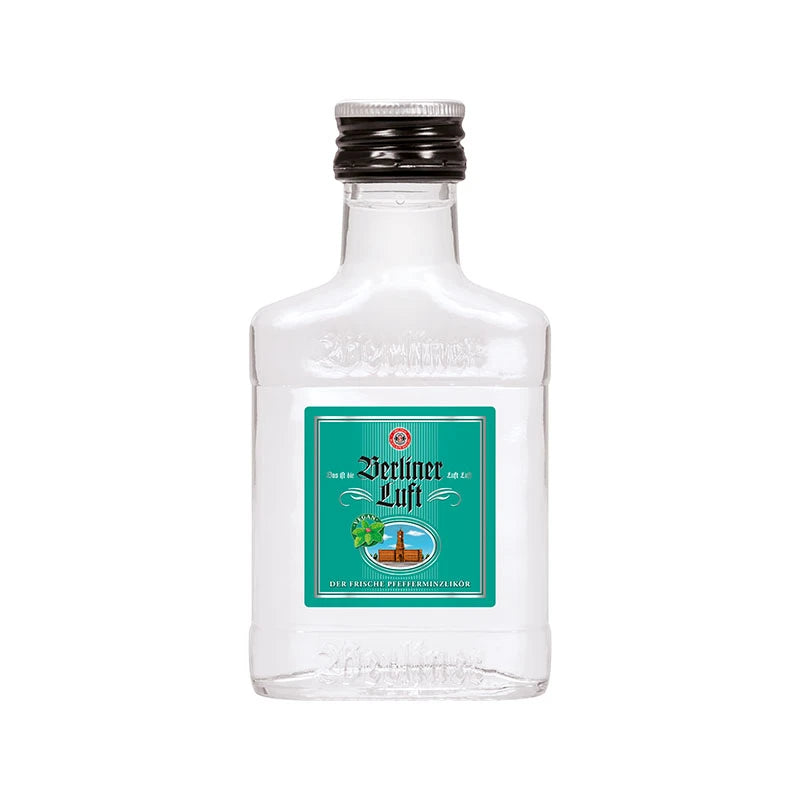 Kleine Flasche Schilkin Berliner Luft 0,1 l mit grünem Etikett, klarer Pfefferminzlikör aus Berlin mit 18 % vol., frischer und süßer Mini-Likörklassiker als Souvenir oder Geschenkidee.