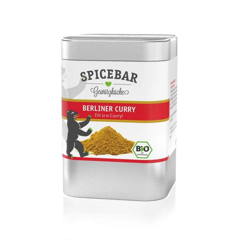 Abbildung einer silbernen Gewürzdose von Spicebar mit der Aufschrift „Berliner Curry – Dit is in Curry!“ und einer Illustration des Berliner Bären neben einem Haufen Currypulver.